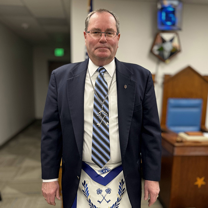 Frank Baker as Lodge Treasurer